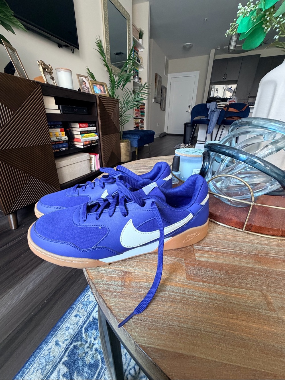 Nike Blue Low-Top Sneakers with White Swoosh and Gum Sole